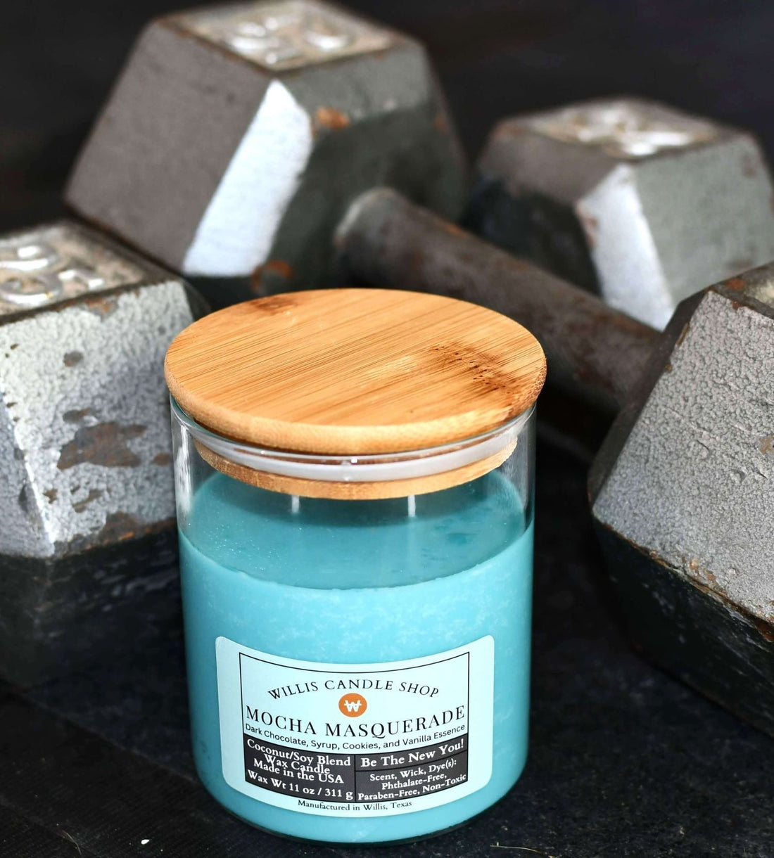 Power workout with double wick candle as Mocha Masquerade aroma candle.