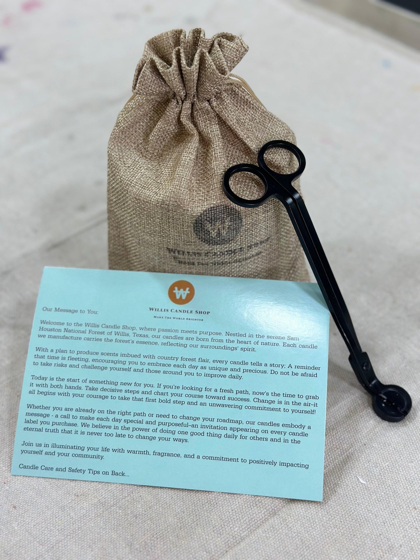 Candle care card and wick trimmers for scented candles at Willis Candle Shop.