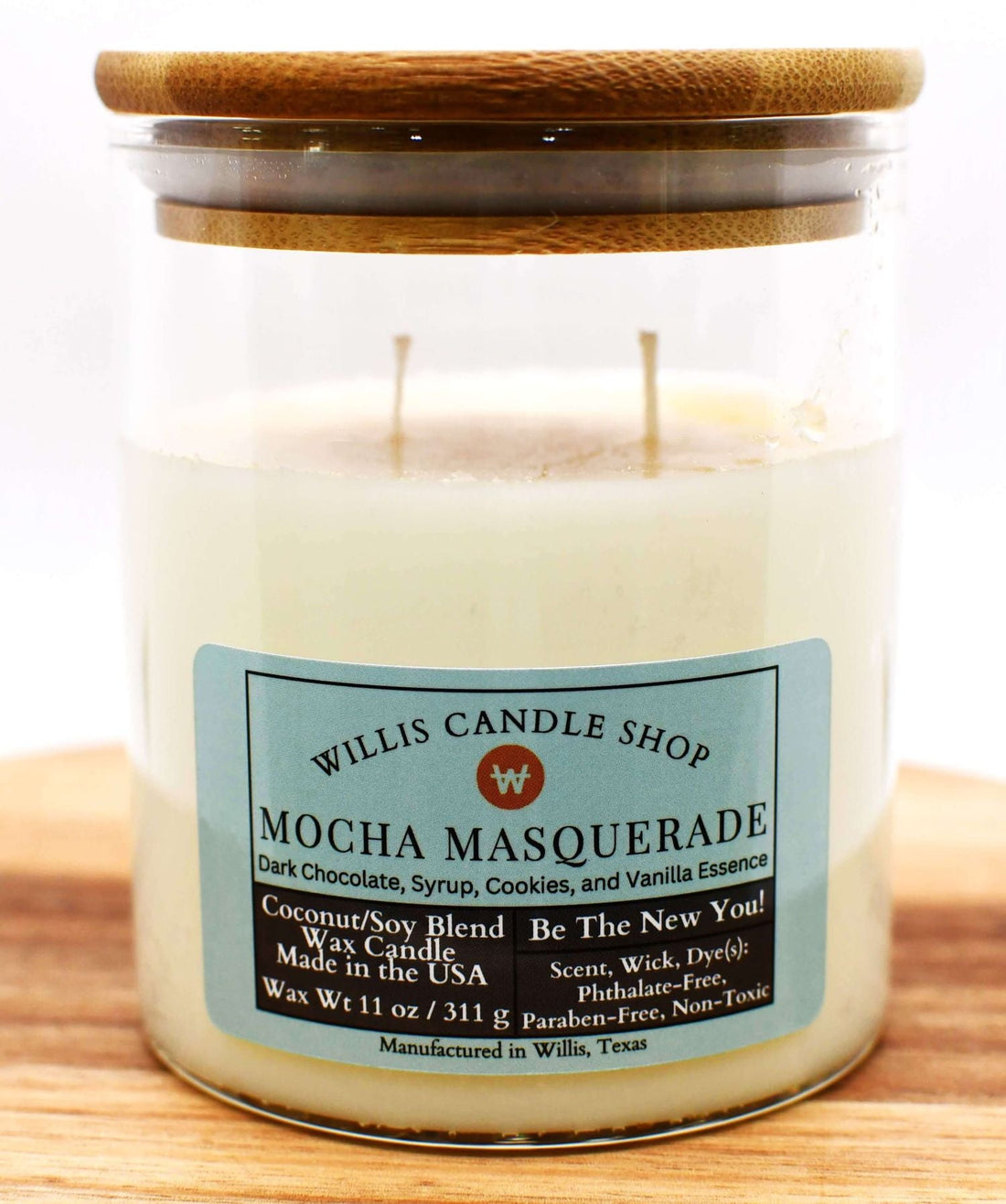 Clear glass candle with double wick candle option and bamboo lid.