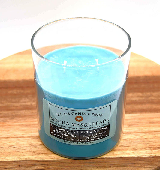 Clear glass candle with double wick candle option and Mocha Masquerade scent.