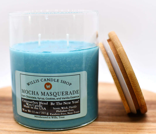 Clear glass candle with double wick candle option and sea green wax color.