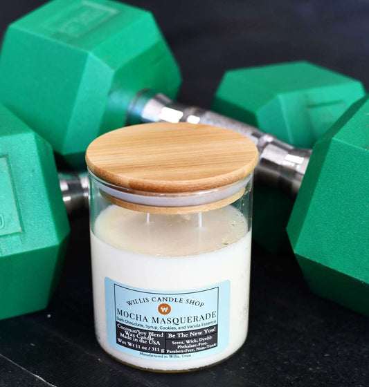 Aroma candle in garage gym with weights at Willis Candle Shop.