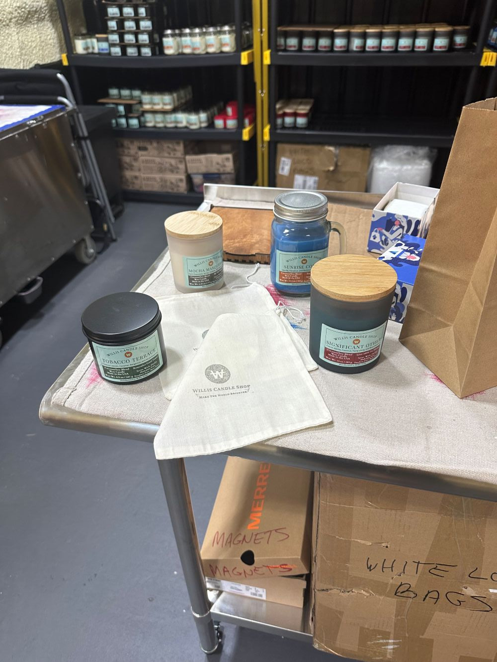 Scented candle packaging for shipment at the Willis Candle Shop.