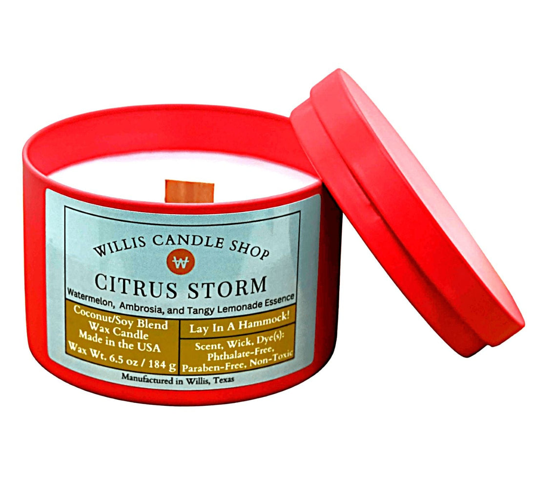 Red tin candle with wooden wick candle option and Citrus Storm fragrance.