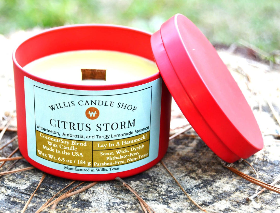 Red tin candle as wood wick candle at Willis, Texas.