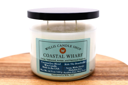 3 wick candle with black press on lid and Coastal Wharf fragrance.