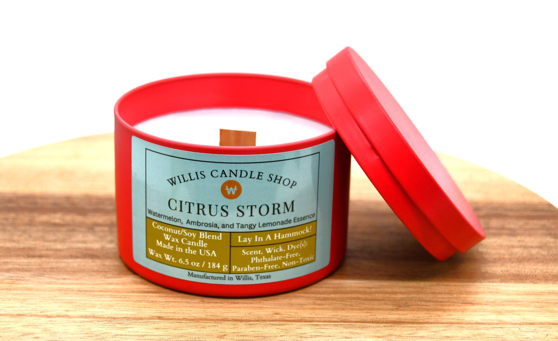 Citrus Storm fragrance with wooden wick candle option in red tin.