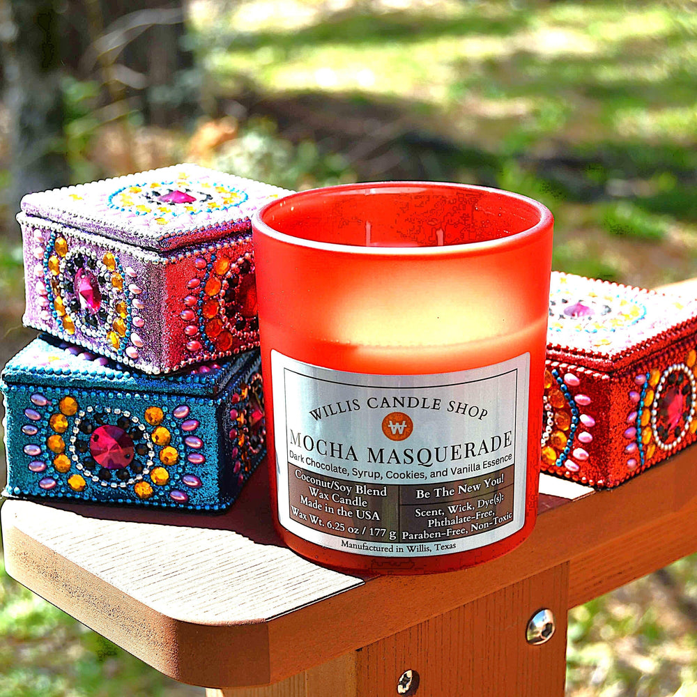 The red frosted candle container with Mocha Masquerade fragrance oil. Always a great smelling candle for any occasion.