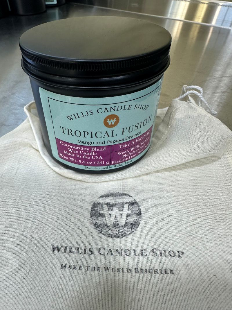 Black tin candle with burlap bag at the Willis Candle Shop.