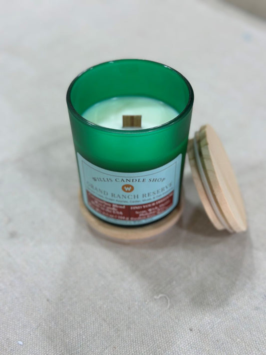 Wood wick candle option in green frosted glass container at Willis Candle Shop.