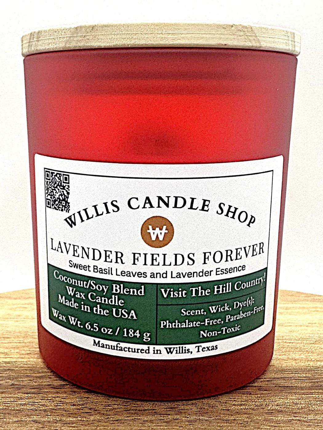 Red frosted glass candle with bamboo lid and Lavender scent.