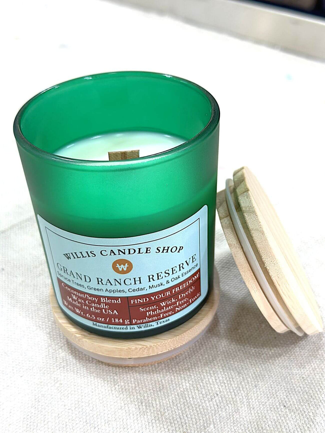 Grand Ranch Reserve candle with wood wick candle option.