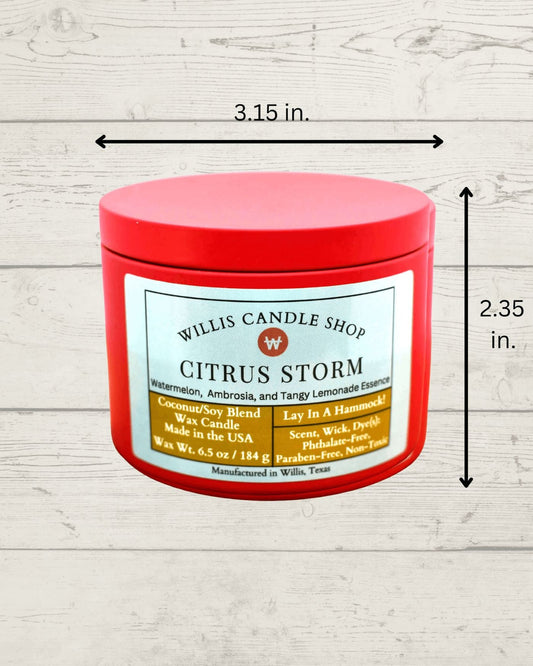 Red tin candle with Citrus Storm fragrance and measurements.