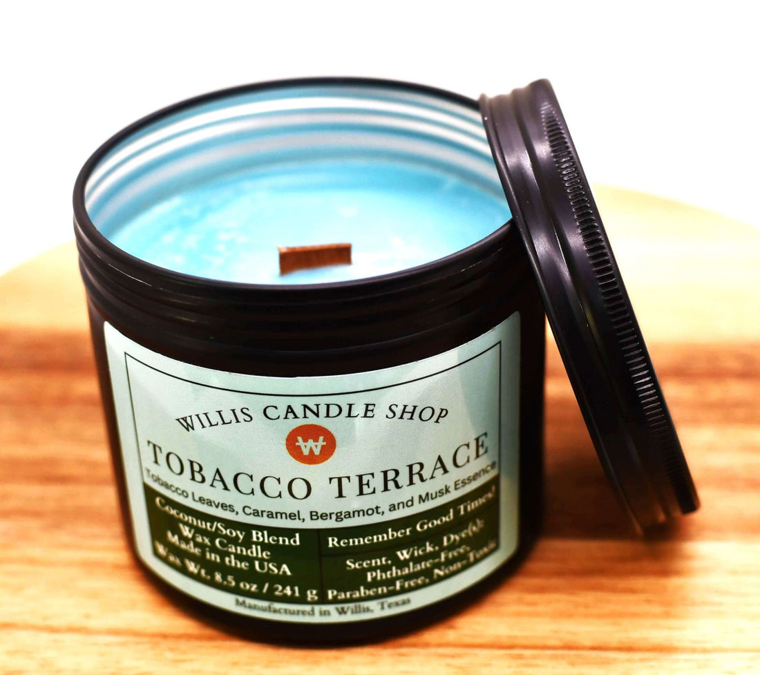 Tobacco candle with sea green wax and wood wick candle option in black tin.