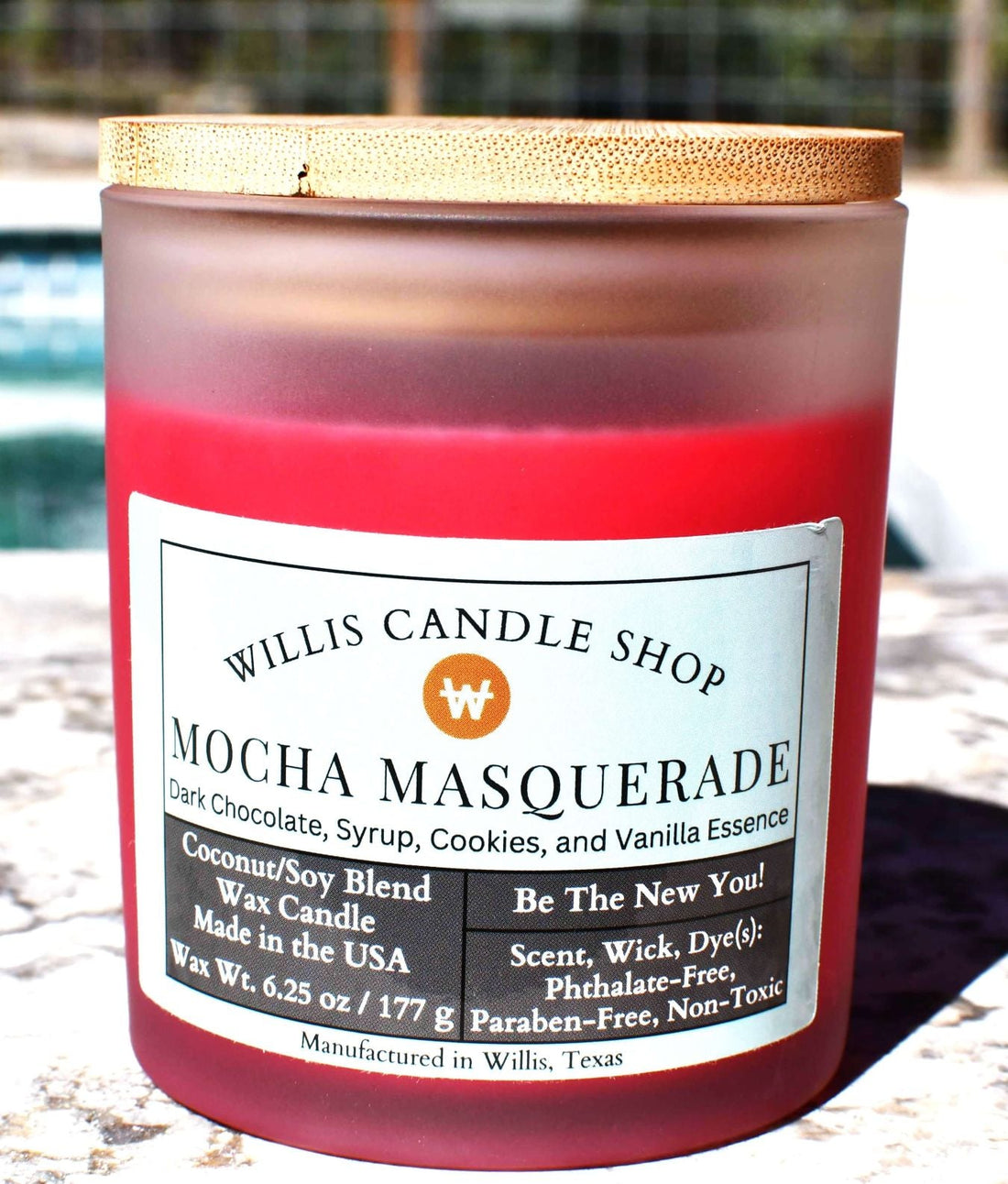 White frosted candle with Mocha Masquerade scent and bamboo lid.