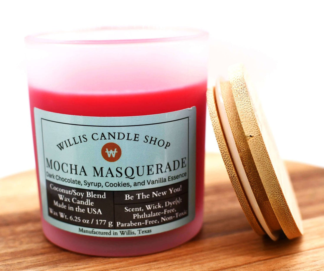 Frosted glass candle with red wax and Mocha Masquerade scent.