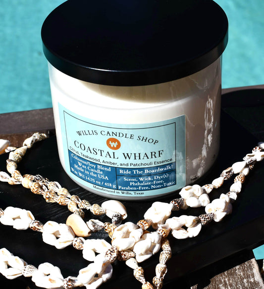 Patchouli candle pool side with shell necklace at Willis Candle Shop.