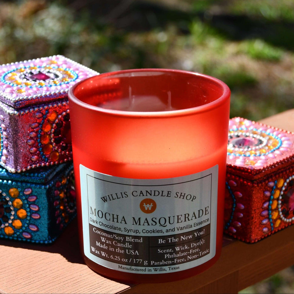 Red frosted glass scented candle with double wicks and bamboo lid.
