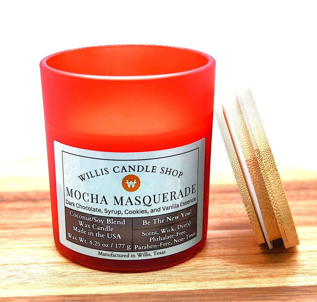Red frosted glass candle with Mocha Masquerade scent and bamboo lid.