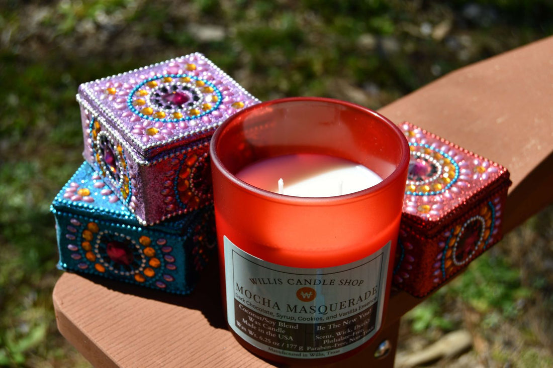 Red frosted glass candle with knick-knacks on arm of chair.