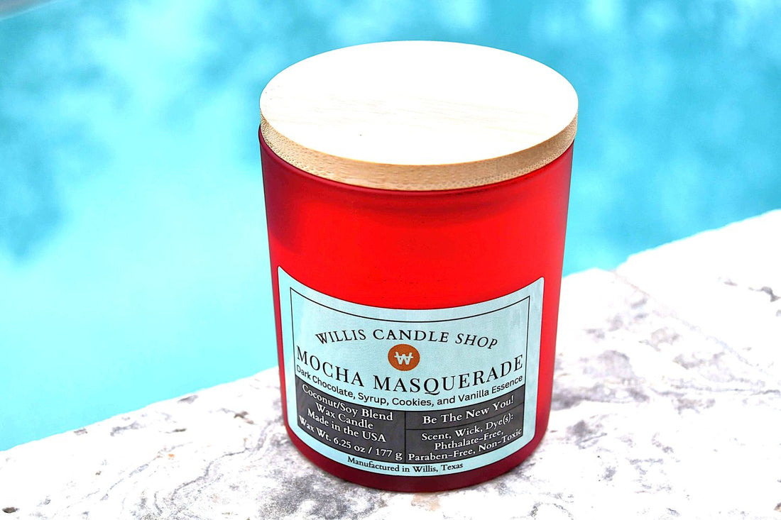 Red frosted glass candle with bamboo lid and Mocha Masquerade scent.