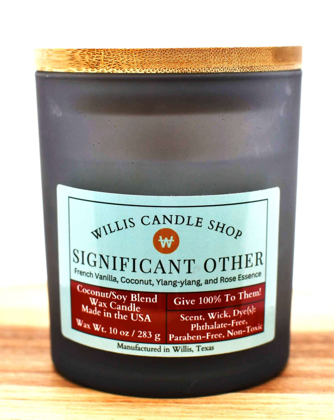 Black frosted glass candle with bamboo lid and Significant Other scented candle option.
