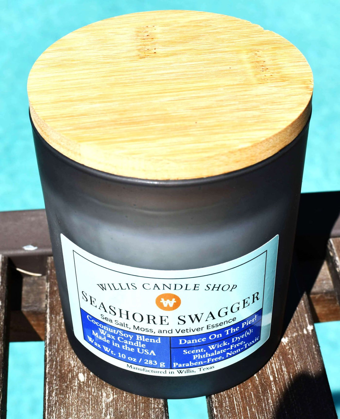 Seashore Swagger fragrant candle option poolside at Willis Candle Shop.