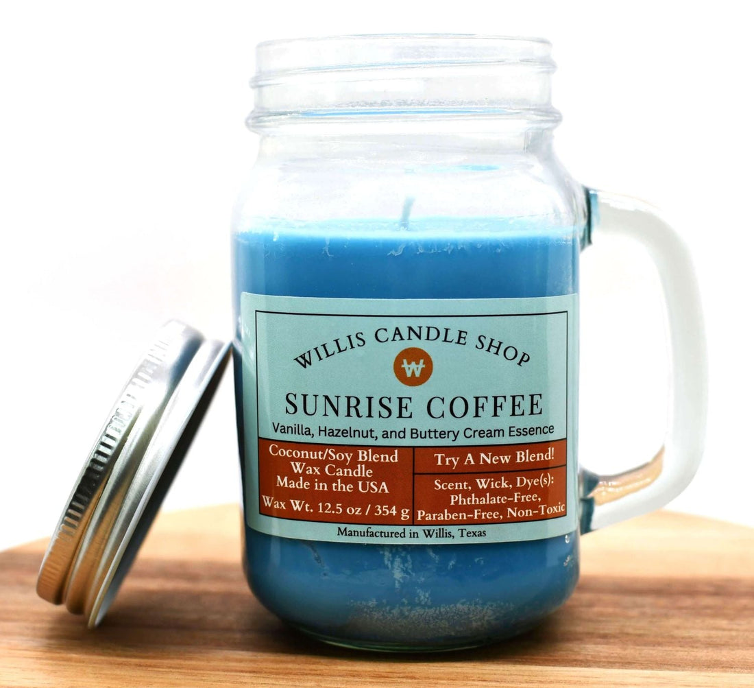 Sunrise Coffee candle with blue wax and silver lid.