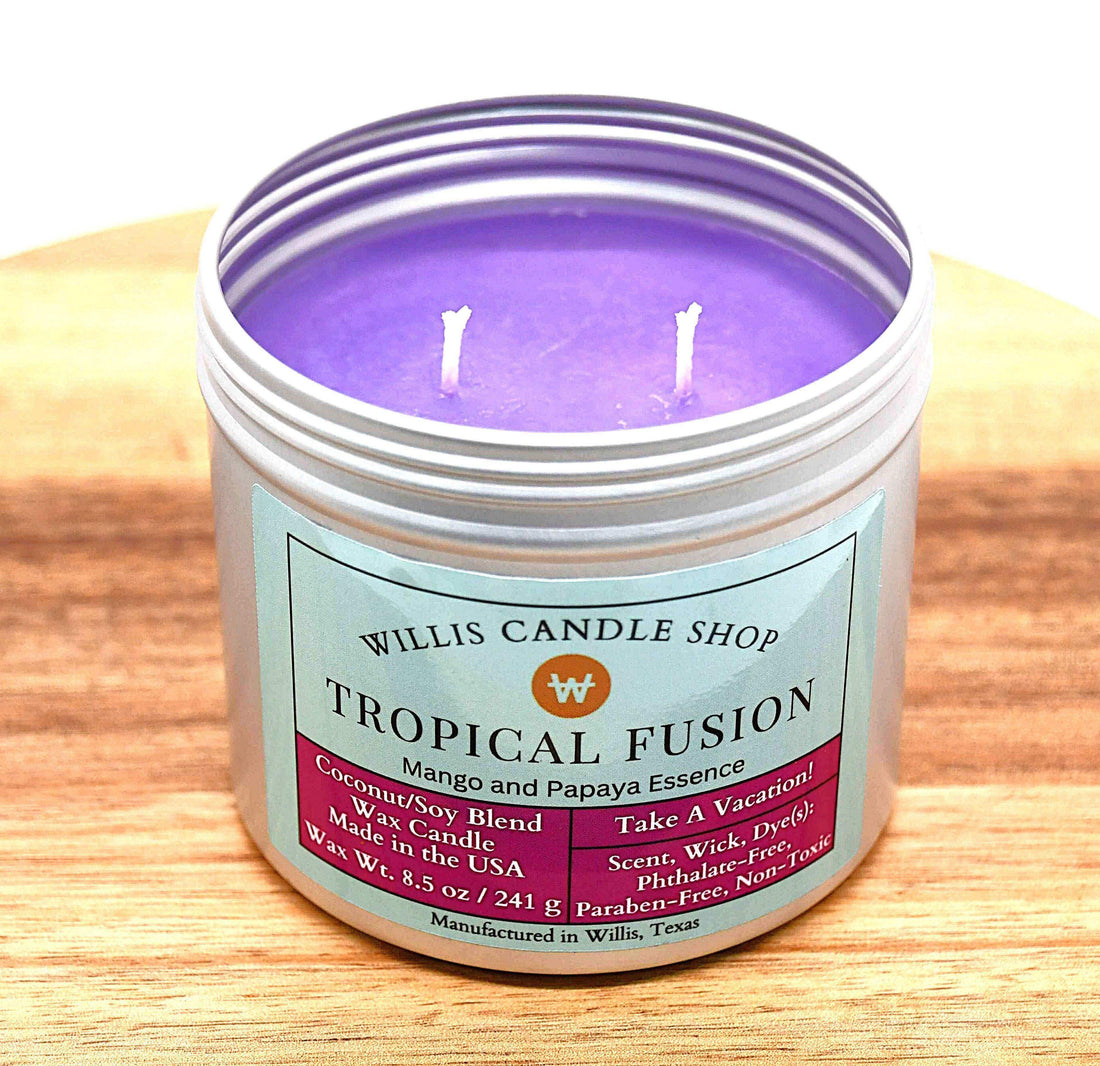 Double wick candle with violet wax in a silver tin candle option.