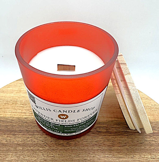 Frosted red candle with wooden wick and Lavender Fields Forever scent.