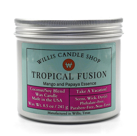 A silver metal jar candle with a silver screw-top lid and a printed front label reading Willis Candle Shop Tropical Fusion, on a clean white background.