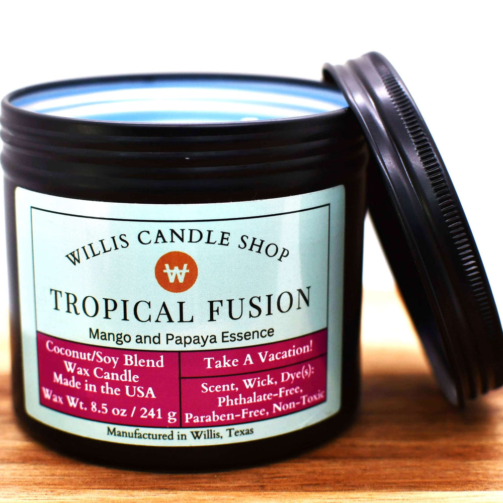 Blue coconut and soy 25/75 blended candle in a 10 ounce black tin with mango and papaya essence.