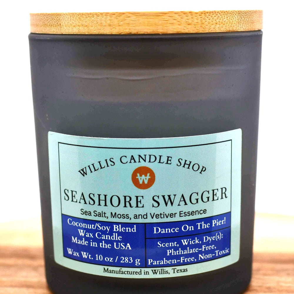 White coconut and soy 25/75 blended candle in a black-frosted container with sea salt, moss, and vetiver essence.