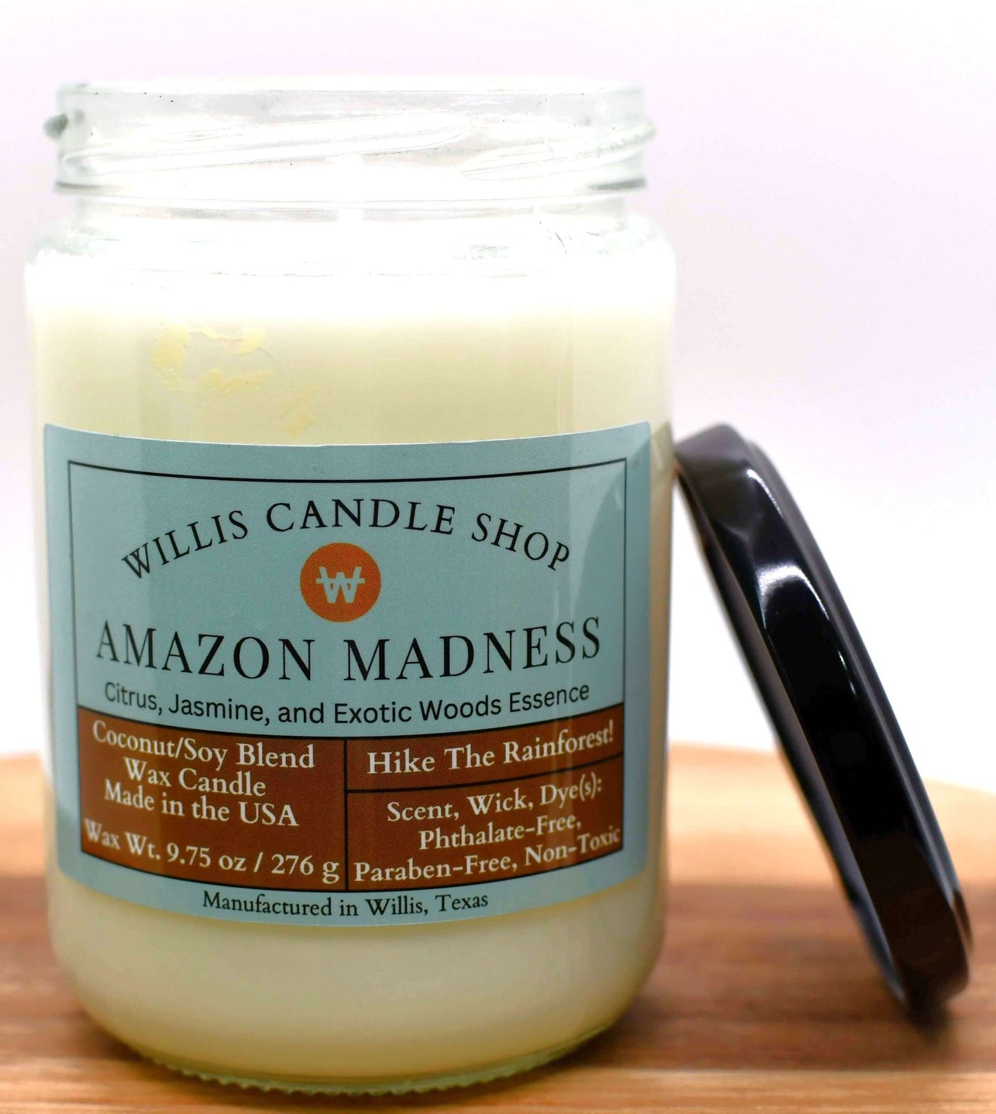 White coconut and soy 25/75 blended candle with Citrus, Jasmine, and exotic woods essence.