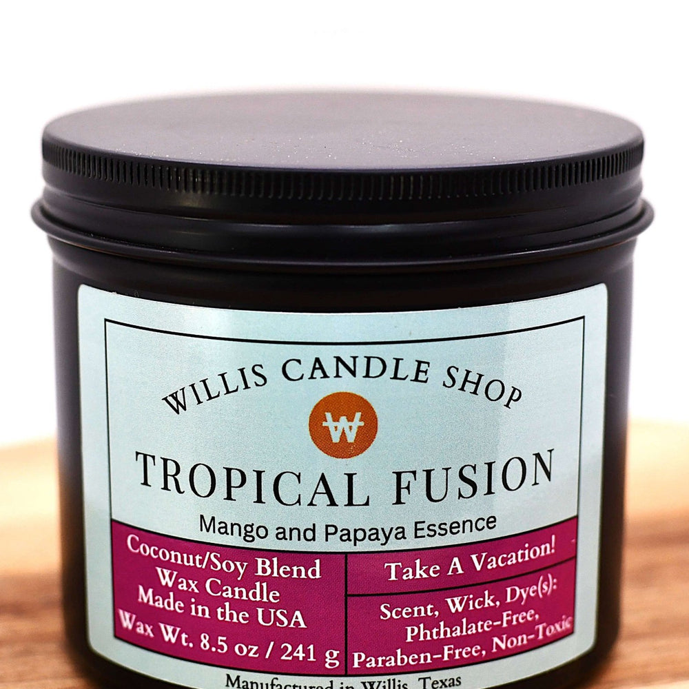 Coconut and soy 25/75 blended candle in a 10 ounce black tin with mango and papaya Tropical Fusion fragrance.