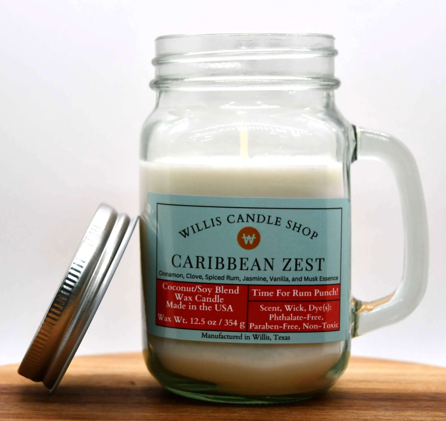 White coconut and soy 25/75 blended candle with spiced rum, jasmine, and vanilla Caribbean Zest fragrance.