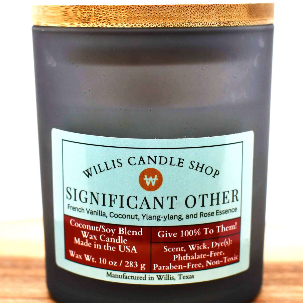 White coconut and soy 25/75 blended candle in a 14.5 ounce black-frosted container with Significant Other Fragrance.