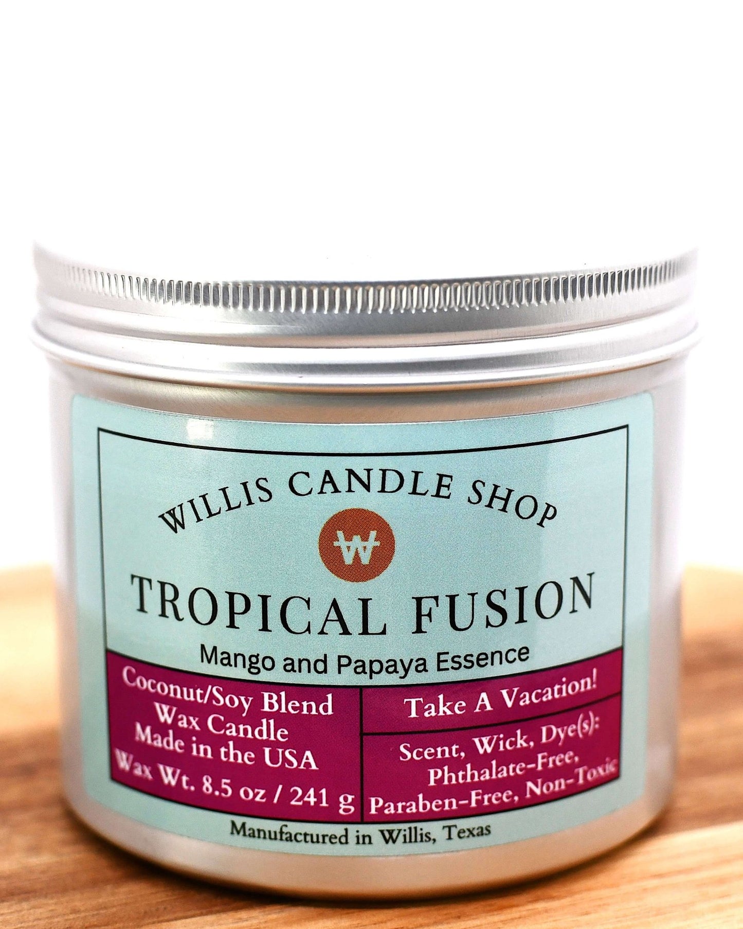 White coconut and soy 25/75 blended candle with 8.5 ounces of wax in a silver tin container with mango and papaya essence.