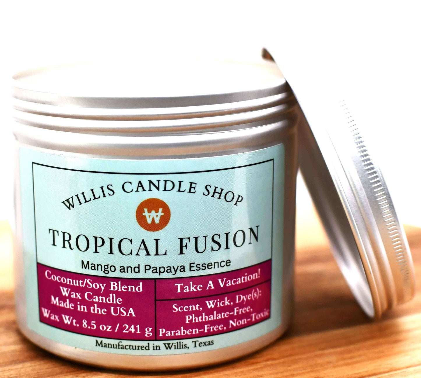 White coconut and soy 25/75 blended candle in a 10 ounce silver tin with 8.5 ounces of wax and Tropical Fusion fragrance.