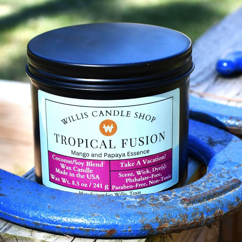 
                  
                    coconut and soy 25/75 blended candle with Tropical Fusion fragrance in a 10 ounce black tin.
                  
                