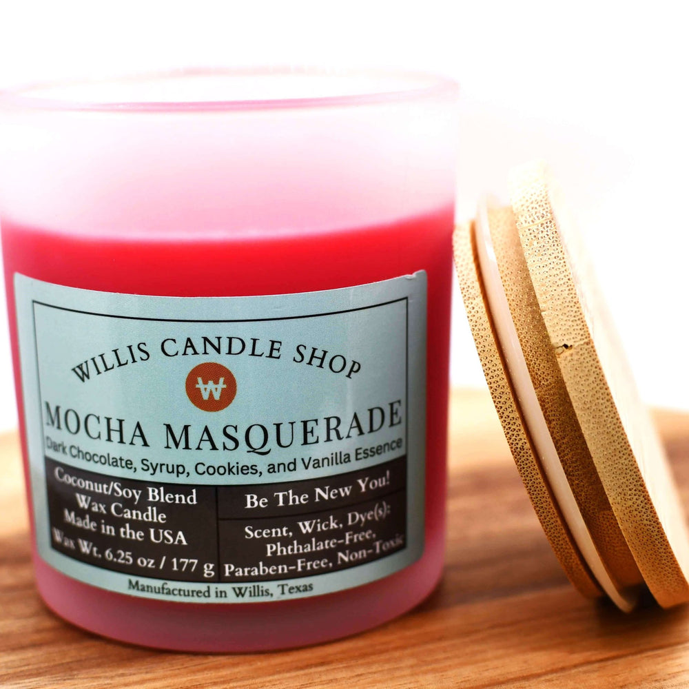 Red coconut and soy 25/75 blended candle Mocha Masquerade scent in a 10 ounce white-frosted container with bamboo lid.