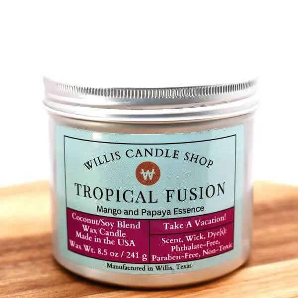 
                  
                    Silver tin candle with Tropical Fusion scented candle option at Willis Candle Shop.
                  
                
