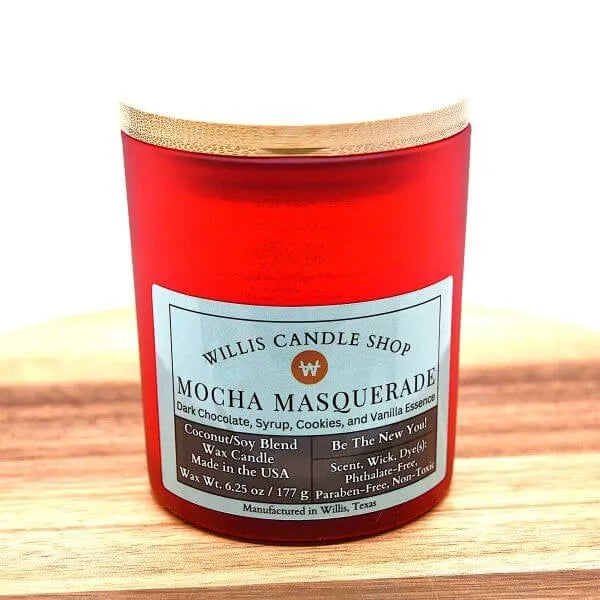 Red frosted glass scented candle with bamboo lid at Willis Candle Shop.