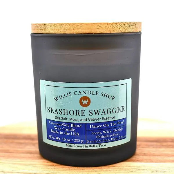 Black frosted glass Seashore Swagger scented candle at Willis Candle Shop.
