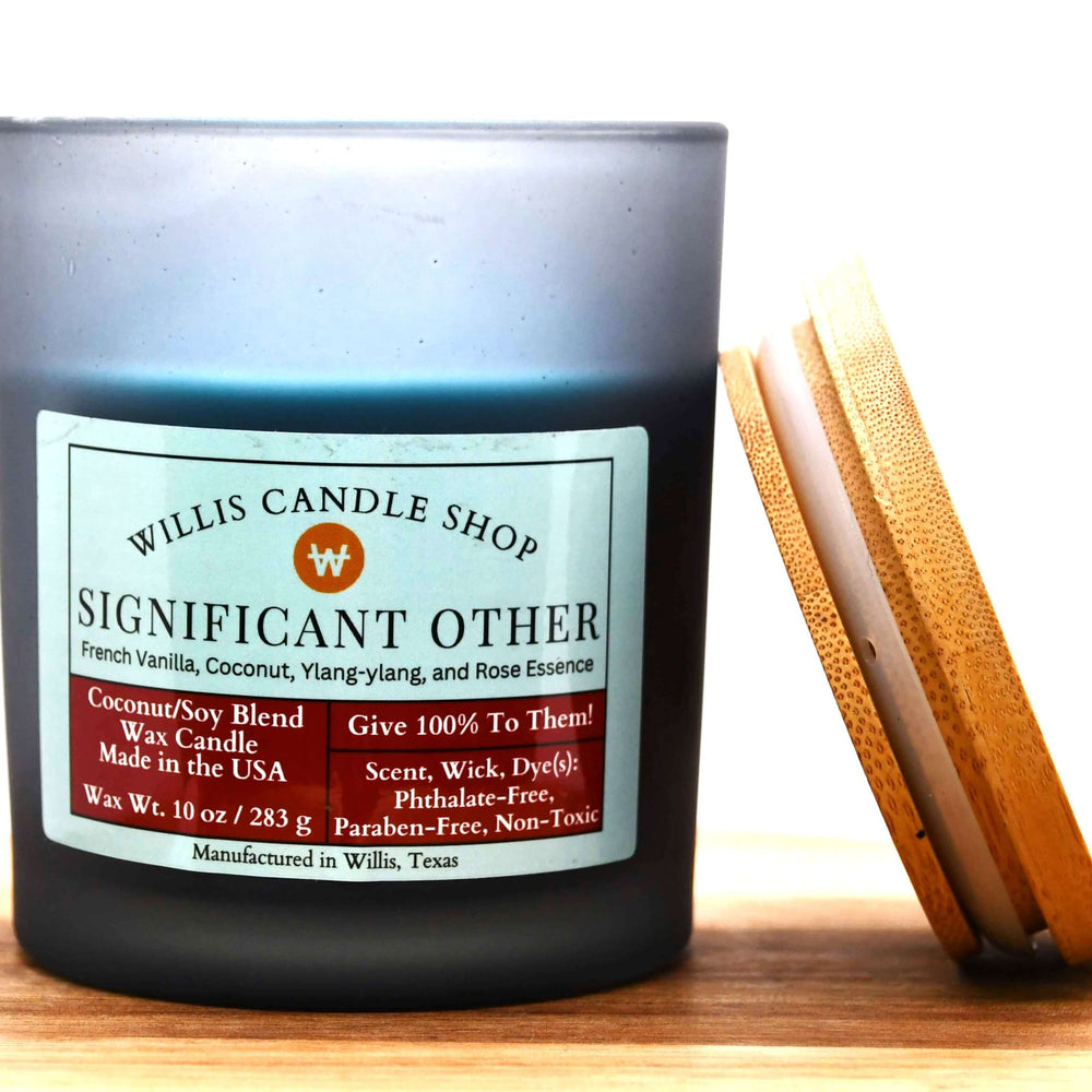 Sea-green coconut and soy 25/75 blended candle with 10 ounces of wax in a 14.5 ounce black frosted container.