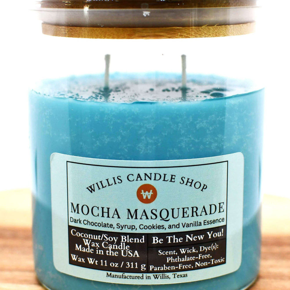 
                  
                    Sea-green coconut and soy 25/75 blended candle with dark chocolate, syrup, cookies Mocha Masquerade fragrance.
                  
                