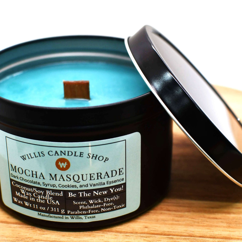 Sea-green coconut and soy 25/75 blended candle with wooden wick in a 14 ounce black tin container.