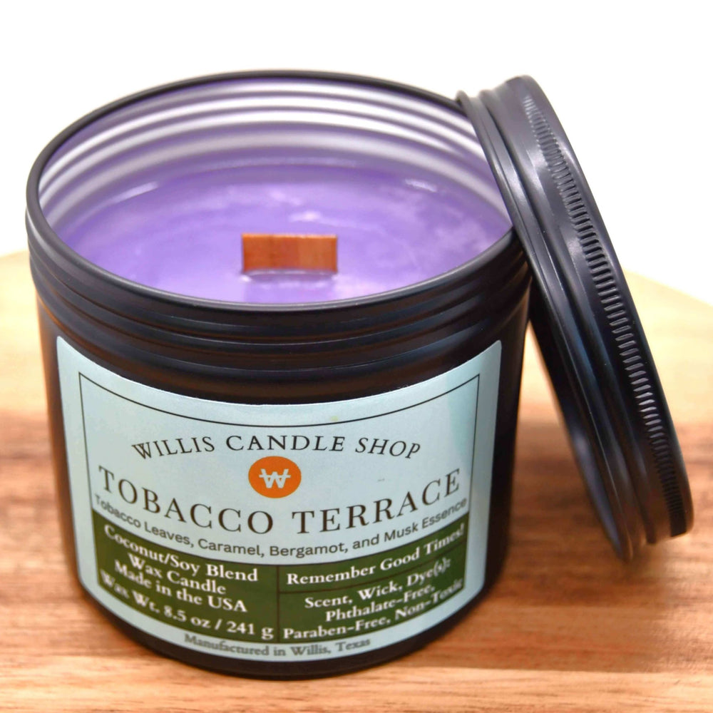 
                  
                    8.5 oz violet coconut-soy wax candle with Tobacco Terrace fragrance in a black tin container, eco-friendly and hand-poured.
                  
                