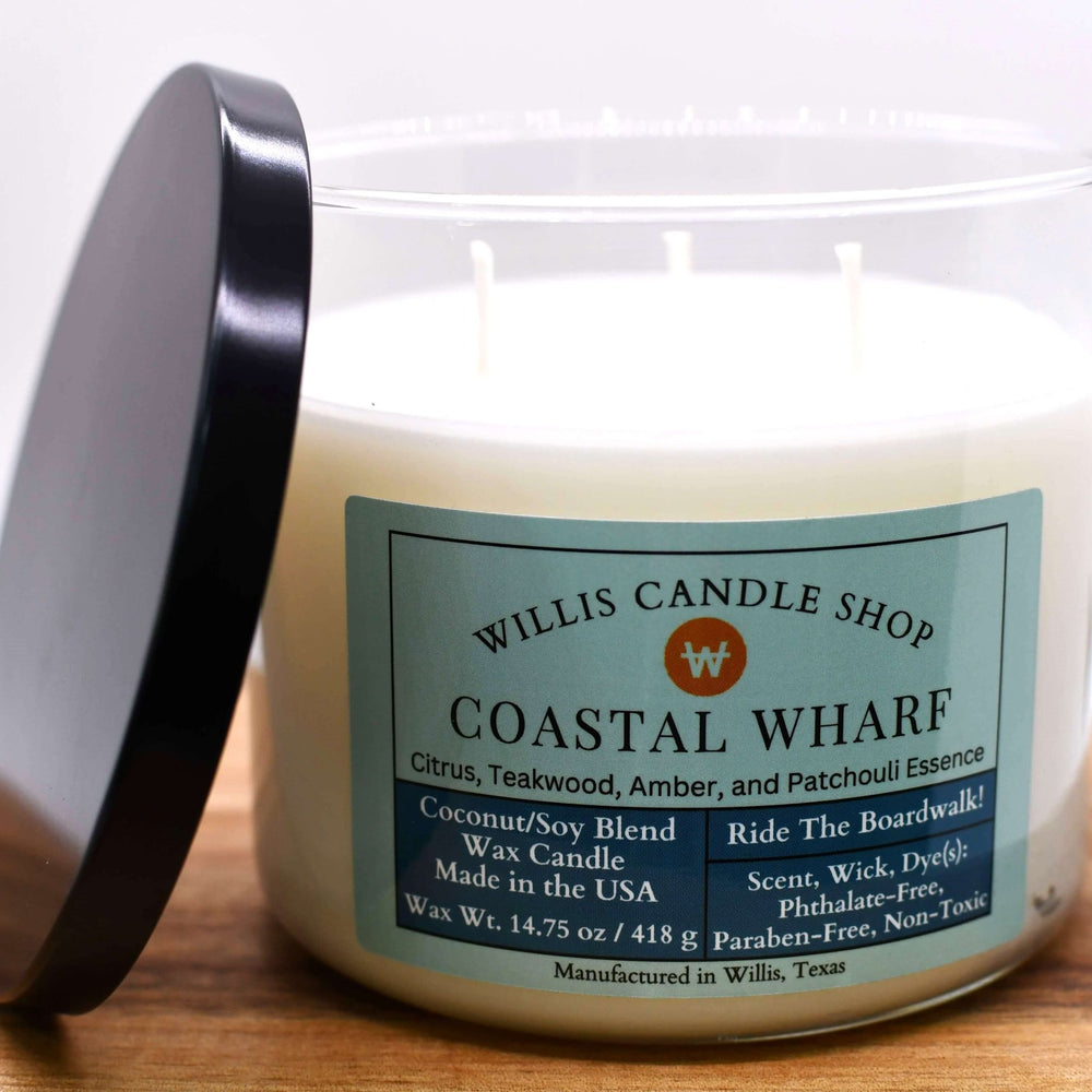 White coconut and soy 25/75 blended candle with Coastal Wharf fragrance in a 21 ounce Contempo glass container.