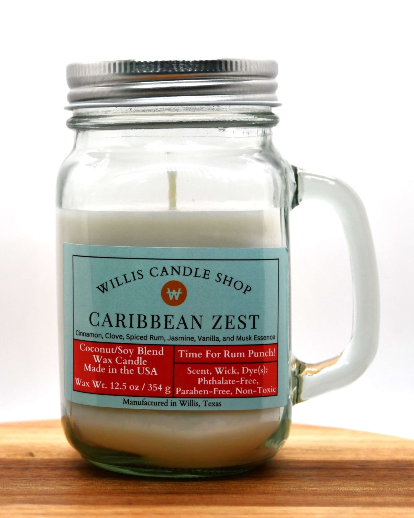 White coconut and soy 25/75 blended candle  in glass mug jar with Caribbean Zest fragrance.